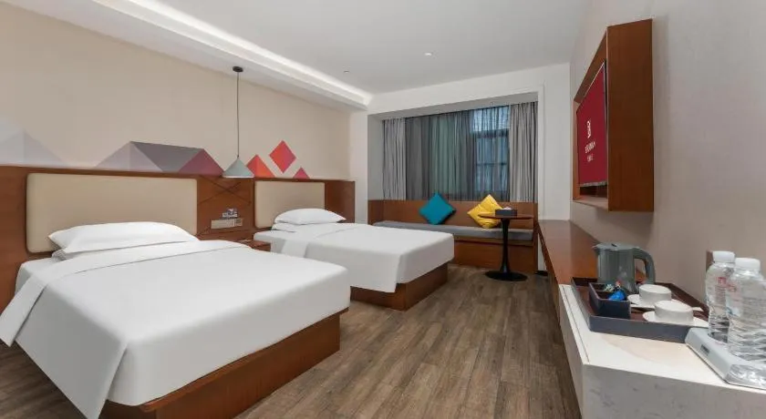 Bed in Borrman Hotel Guangzhou Southern Hospital Meihuayuan Metro Station