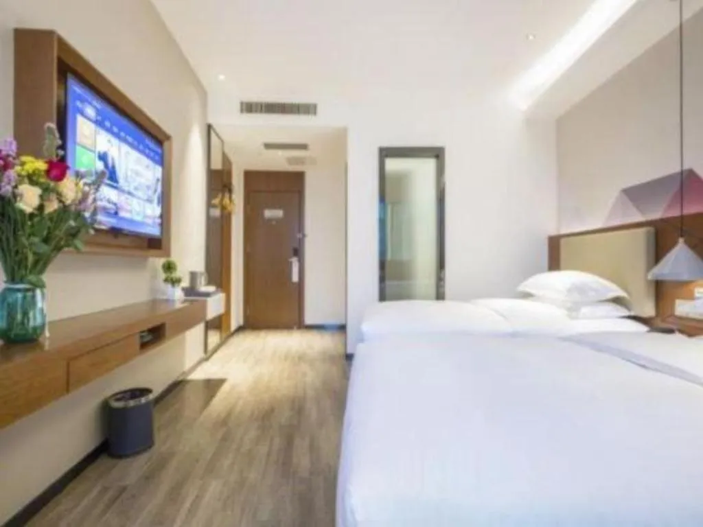 Bed in Borrman Hotel Guangzhou Southern Hospital Meihuayuan Metro Station