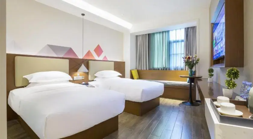 Bed in Borrman Hotel Guangzhou Southern Hospital Meihuayuan Metro Station Bed in Borrman Hotel Guangzhou Southern Hospital Meihuayuan Metro Station