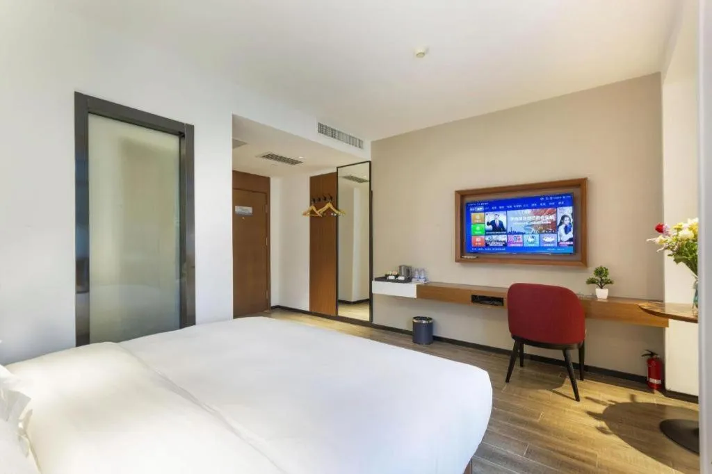 Bed in Borrman Hotel Guangzhou Southern Hospital Meihuayuan Metro Station