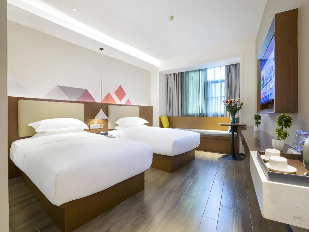 Bed in Borrman Hotel Guangzhou Southern Hospital Meihuayuan Metro Station