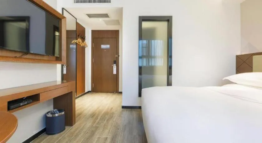 Bed in Borrman Hotel Guangzhou Southern Hospital Meihuayuan Metro Station