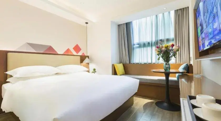 Bed in Borrman Hotel Guangzhou Southern Hospital Meihuayuan Metro Station Bed in Borrman Hotel Guangzhou Southern Hospital Meihuayuan Metro Station