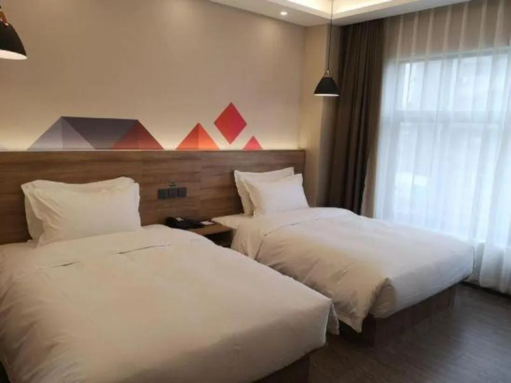 Bed in Borrman Hotel Guangzhou Southern Hospital Meihuayuan Metro Station