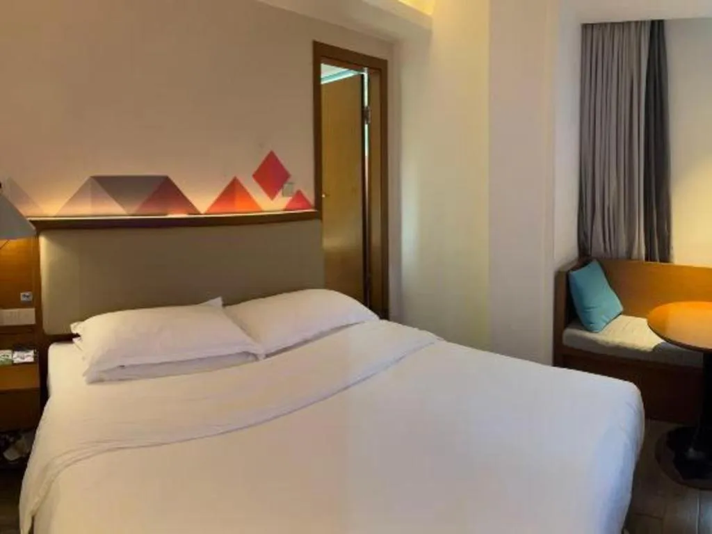 Bed in Borrman Hotel Guangzhou Southern Hospital Meihuayuan Metro Station