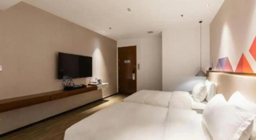 Bed in Borrman Hotel Guangzhou Southern Hospital Meihuayuan Metro Station