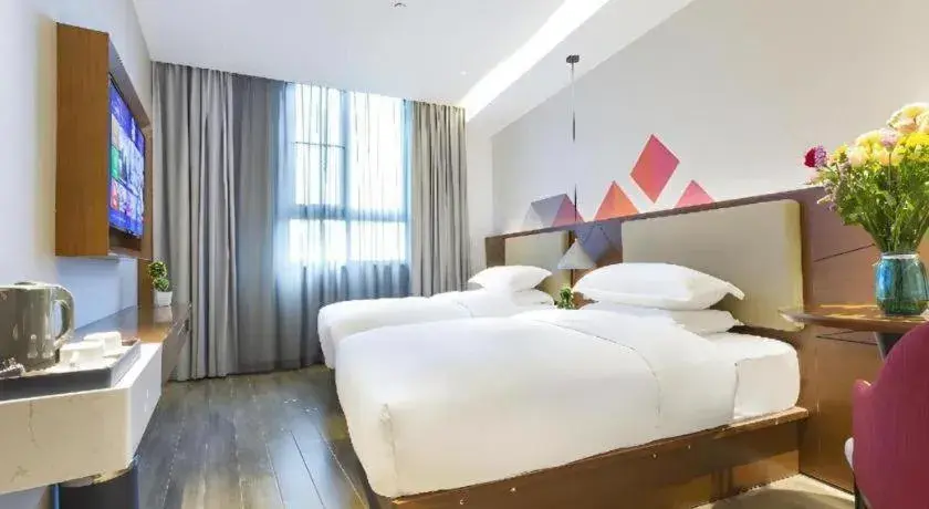 Bed in Borrman Hotel Guangzhou Southern Hospital Meihuayuan Metro Station Bed in Borrman Hotel Guangzhou Southern Hospital Meihuayuan Metro Station