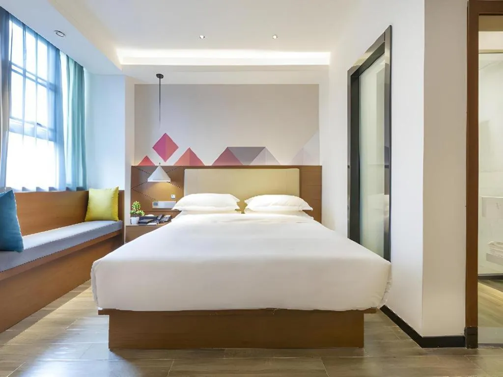 Bed in Borrman Hotel Guangzhou Southern Hospital Meihuayuan Metro Station