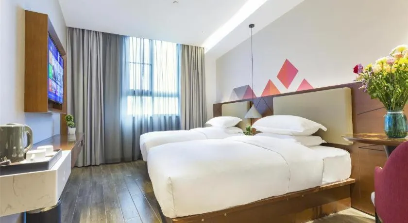 Bed in Borrman Hotel Guangzhou Southern Hospital Meihuayuan Metro Station