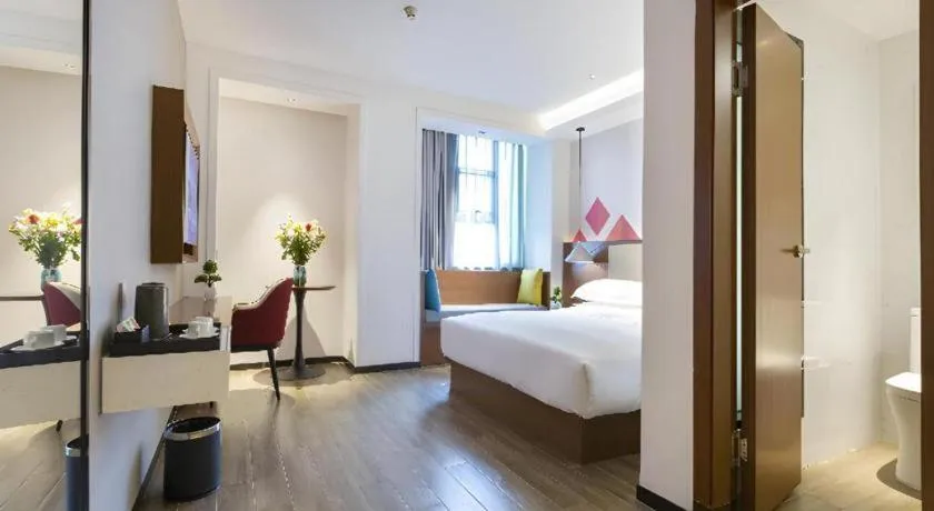 Bed in Borrman Hotel Guangzhou Southern Hospital Meihuayuan Metro Station