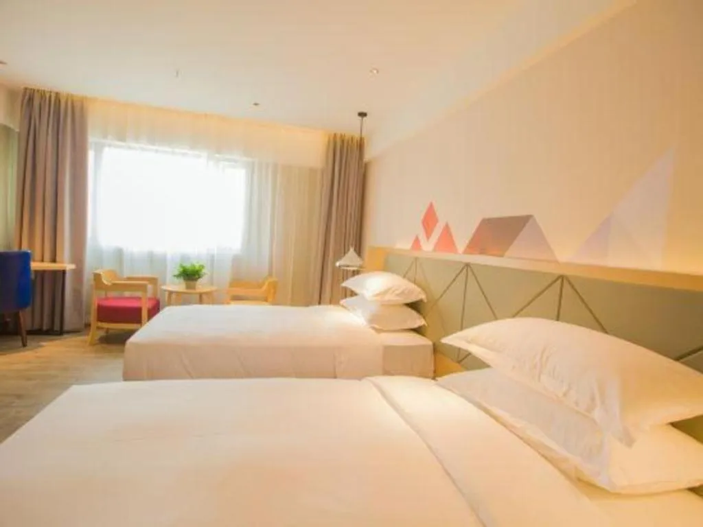 Bed in Borrman Hotel Guangzhou Southern Hospital Meihuayuan Metro Station