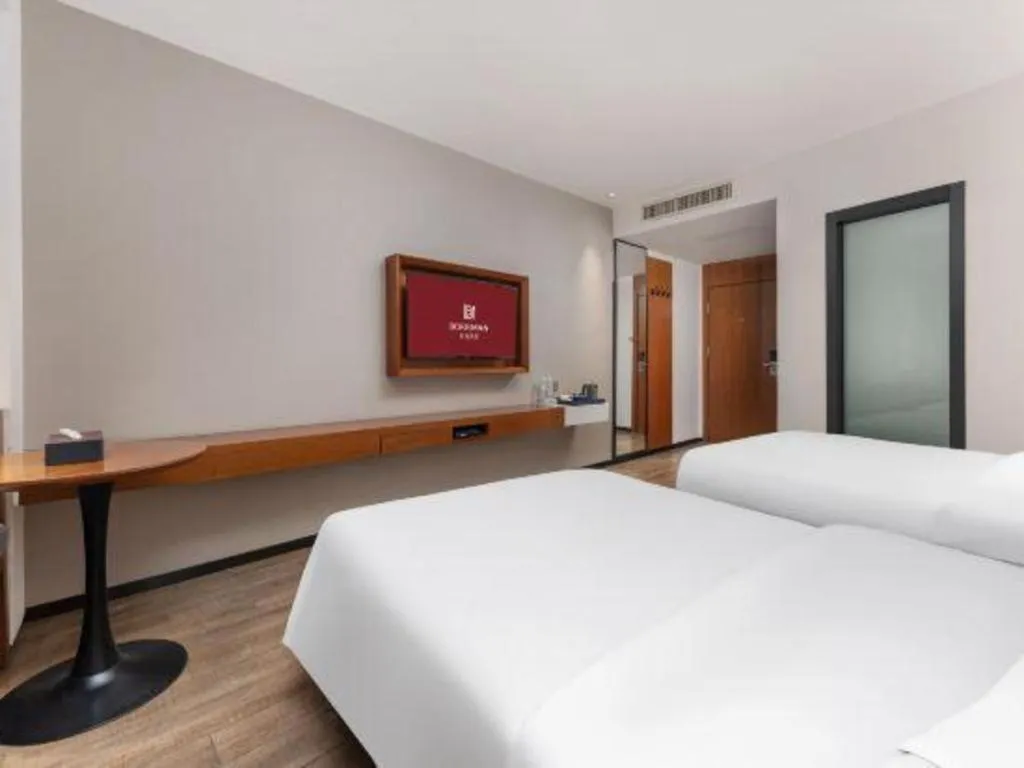 Bed in Borrman Hotel Guangzhou Southern Hospital Meihuayuan Metro Station