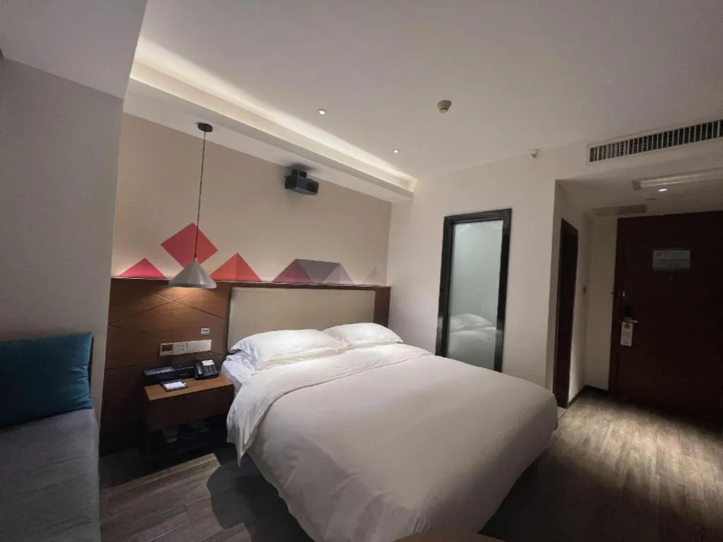 Bed in Borrman Hotel Guangzhou Southern Hospital Meihuayuan Metro Station