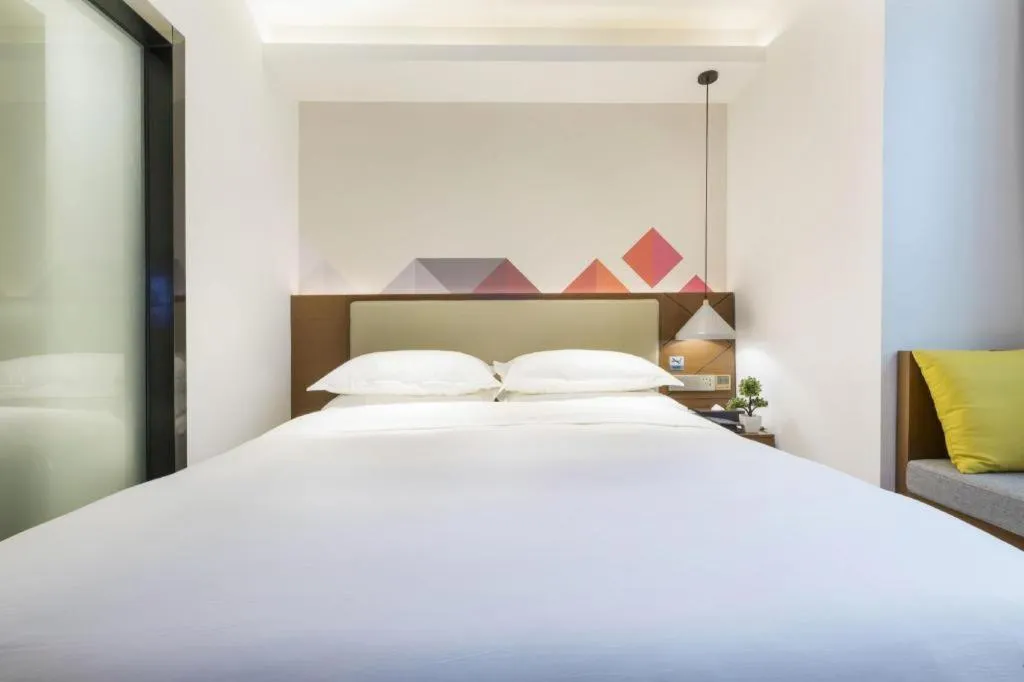 Bed in Borrman Hotel Guangzhou Southern Hospital Meihuayuan Metro Station