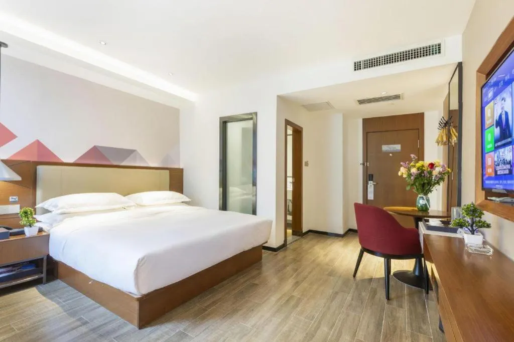 Bed in Borrman Hotel Guangzhou Southern Hospital Meihuayuan Metro Station