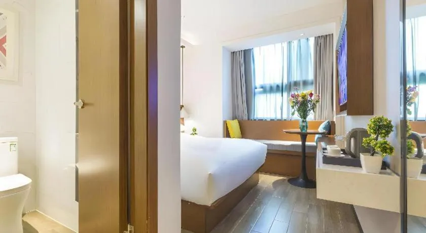 Bed in Borrman Hotel Guangzhou Southern Hospital Meihuayuan Metro Station