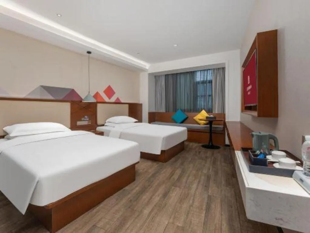 Bed in Borrman Hotel Guangzhou Southern Hospital Meihuayuan Metro Station