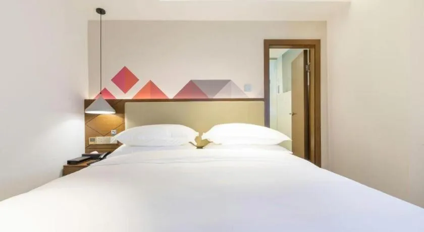 Bed in Borrman Hotel Guangzhou Southern Hospital Meihuayuan Metro Station