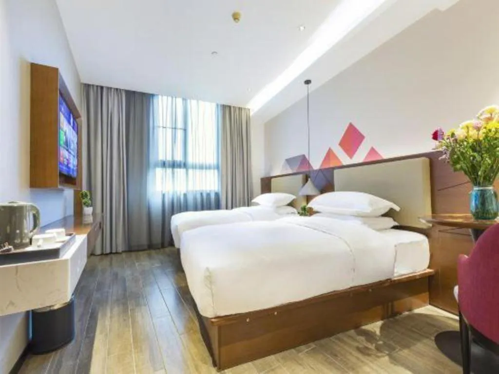 Bed in Borrman Hotel Guangzhou Southern Hospital Meihuayuan Metro Station