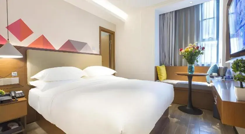 Bed in Borrman Hotel Guangzhou Southern Hospital Meihuayuan Metro Station Bed in Borrman Hotel Guangzhou Southern Hospital Meihuayuan Metro Station