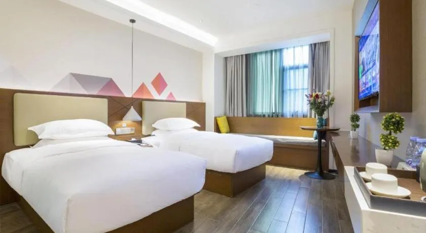 Bed in Borrman Hotel Guangzhou Southern Hospital Meihuayuan Metro Station