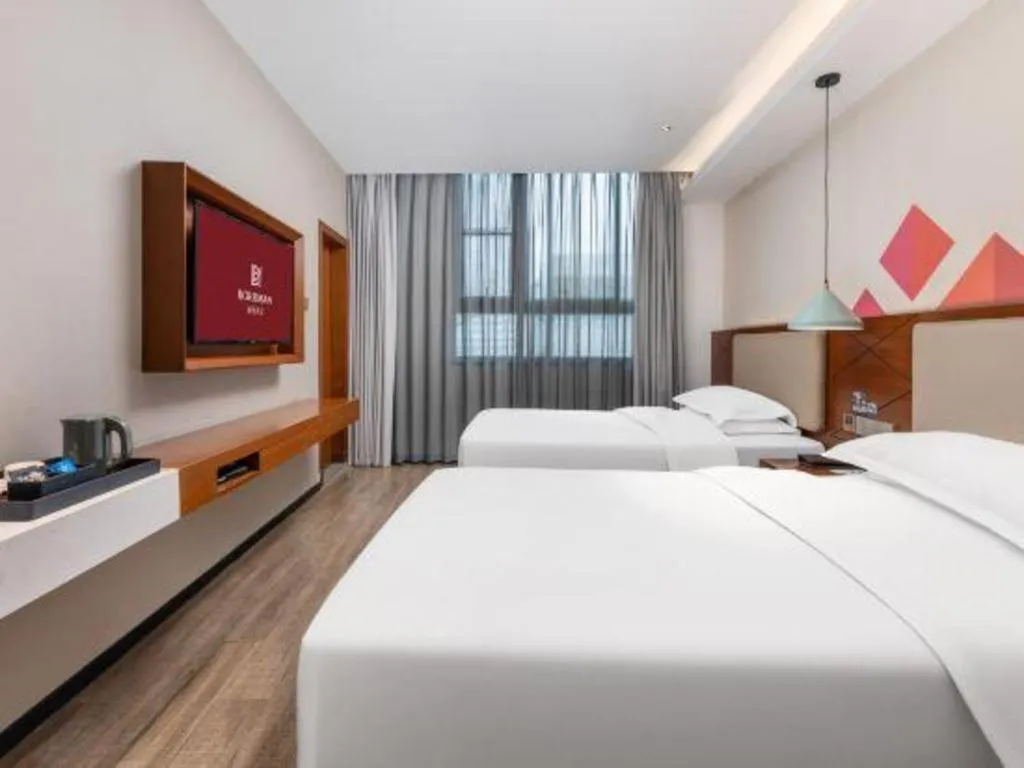 Bed in Borrman Hotel Guangzhou Southern Hospital Meihuayuan Metro Station