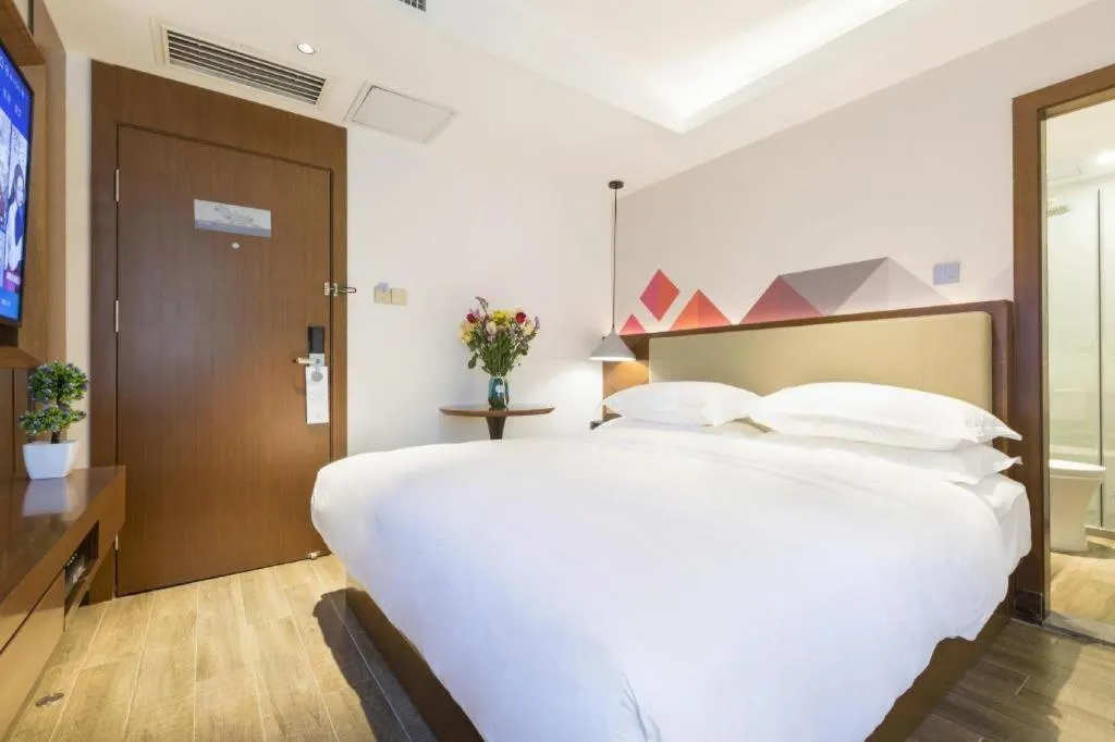 Bed in Borrman Hotel Guangzhou Southern Hospital Meihuayuan Metro Station