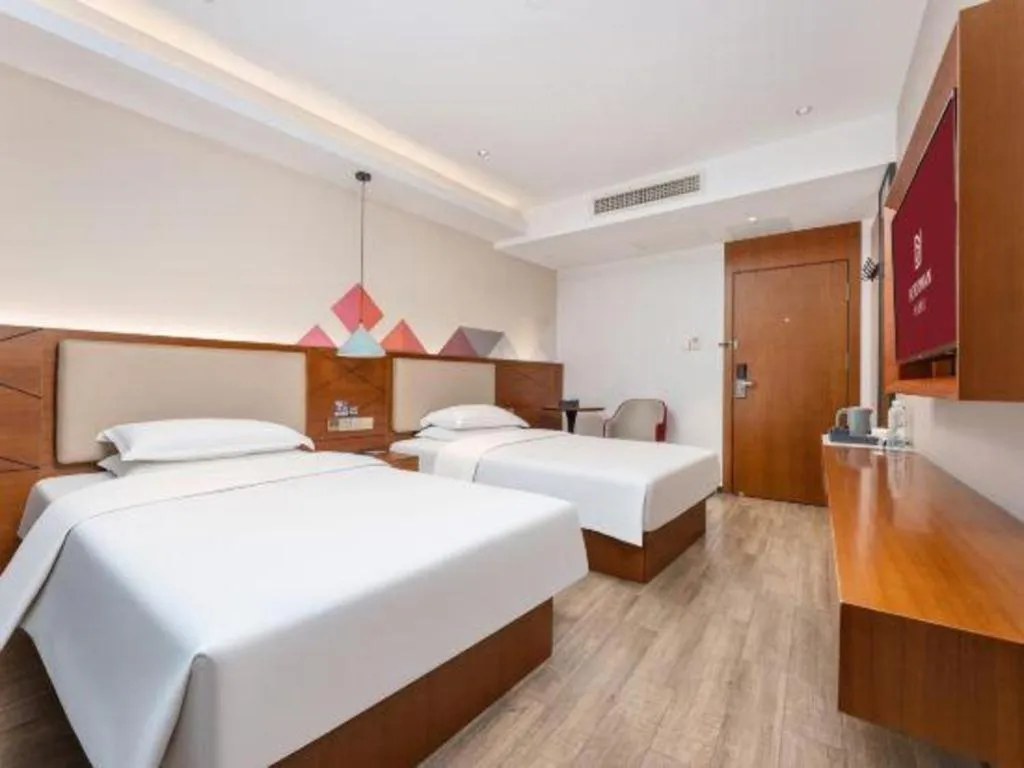 Bed in Borrman Hotel Guangzhou Southern Hospital Meihuayuan Metro Station