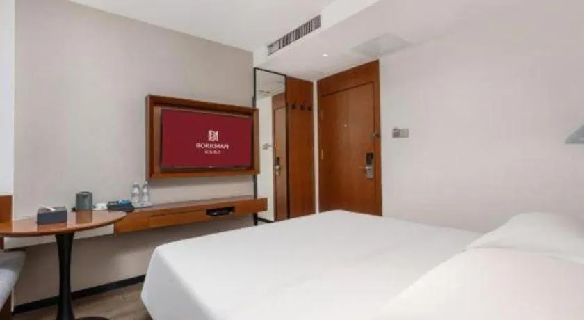 Bed in Borrman Hotel Guangzhou Southern Hospital Meihuayuan Metro Station