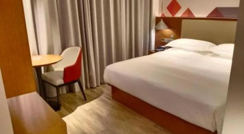 Bed in Borrman Hotel Guangzhou Southern Hospital Meihuayuan Metro Station