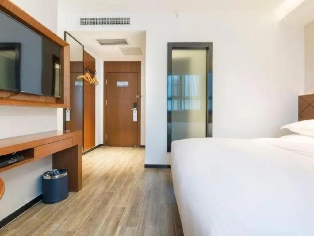 Bed in Borrman Hotel Guangzhou Southern Hospital Meihuayuan Metro Station