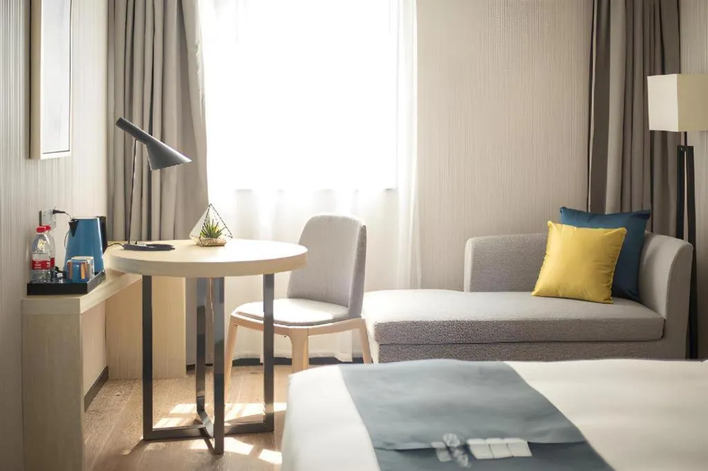 Bed in Echarm Hotel Shenzhen World Exhibition and Convention Center