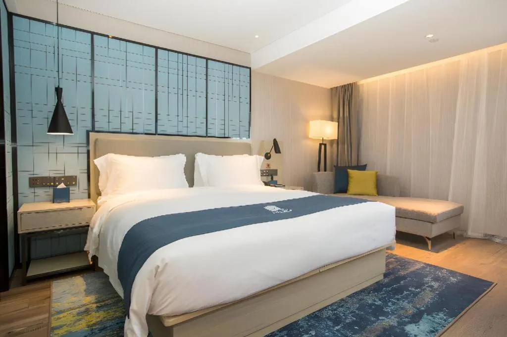 Bed in Echarm Hotel Shenzhen World Exhibition and Convention Center