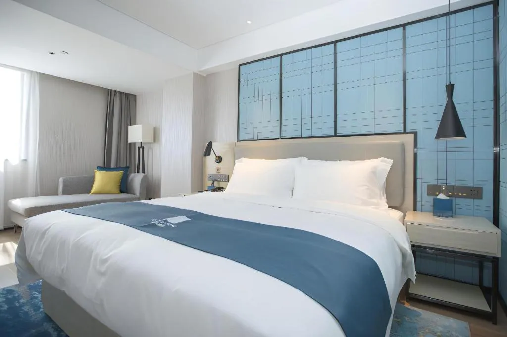 Bed in Echarm Hotel Shenzhen World Exhibition and Convention Center