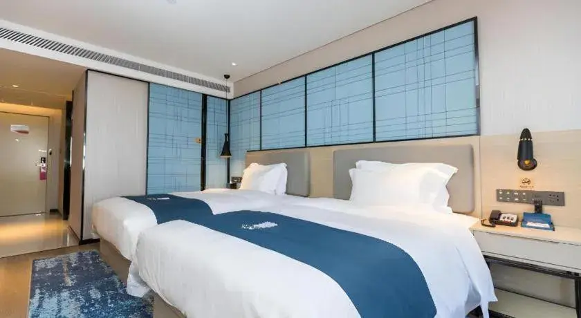 Bed in Echarm Hotel Shenzhen World Exhibition and Convention Center Bed in Echarm Hotel Shenzhen World Exhibition and Convention Center