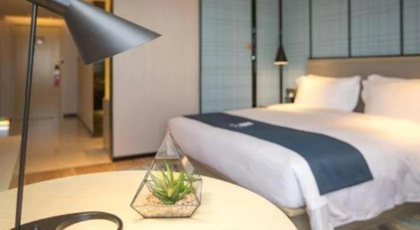 Bed in Echarm Hotel Shenzhen World Exhibition and Convention Center