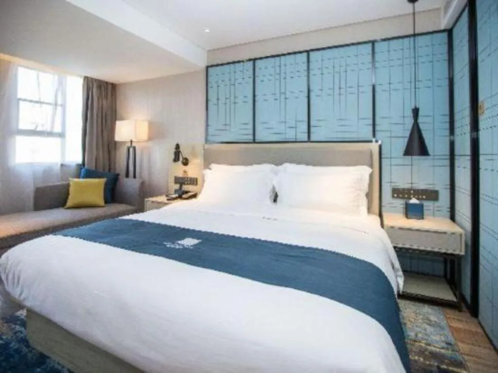 Bed in Echarm Hotel Shenzhen World Exhibition and Convention Center