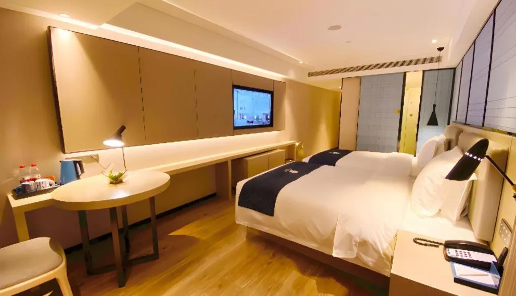 Bed in Echarm Hotel Shenzhen World Exhibition and Convention Center