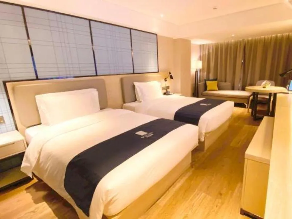 Bed in Echarm Hotel Shenzhen World Exhibition and Convention Center