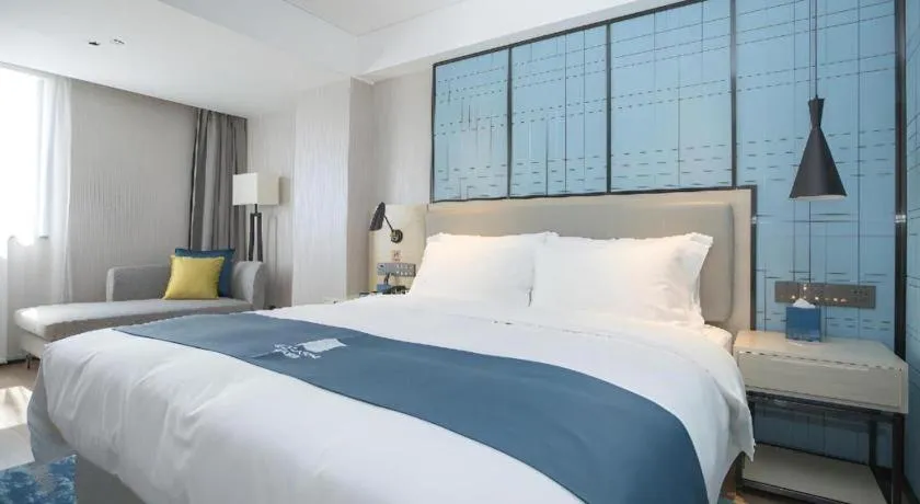 Bed in Echarm Hotel Shenzhen World Exhibition and Convention Center