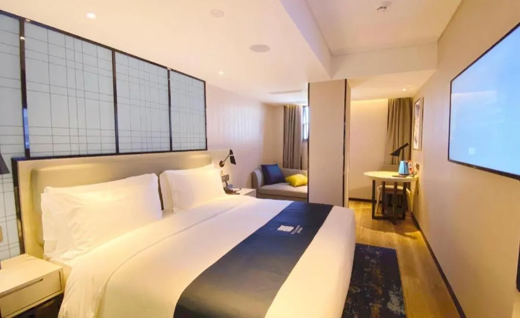 Bed in Echarm Hotel Shenzhen World Exhibition and Convention Center