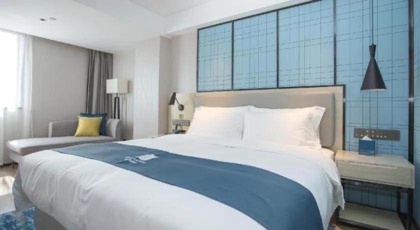 Bed in Echarm Hotel Shenzhen World Exhibition and Convention Center