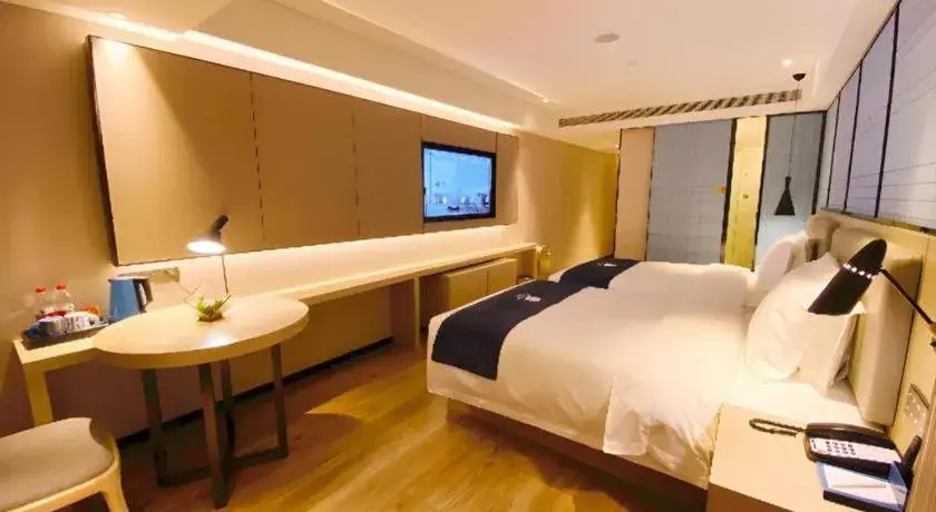 Bed in Echarm Hotel Shenzhen World Exhibition and Convention Center Bed in Echarm Hotel Shenzhen World Exhibition and Convention Center