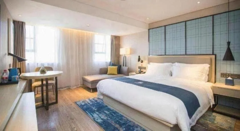 Bed in Echarm Hotel Shenzhen World Exhibition and Convention Center