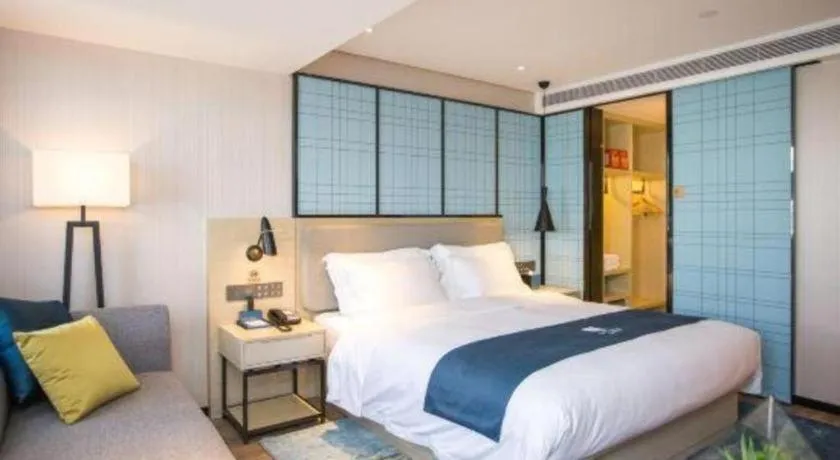 Bed in Echarm Hotel Shenzhen World Exhibition and Convention Center