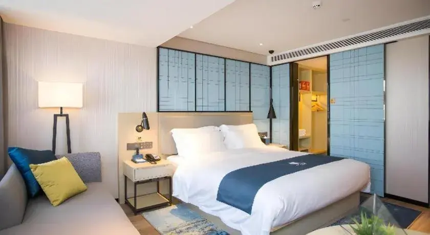 Bed in Echarm Hotel Shenzhen World Exhibition and Convention Center Bed in Echarm Hotel Shenzhen World Exhibition and Convention Center