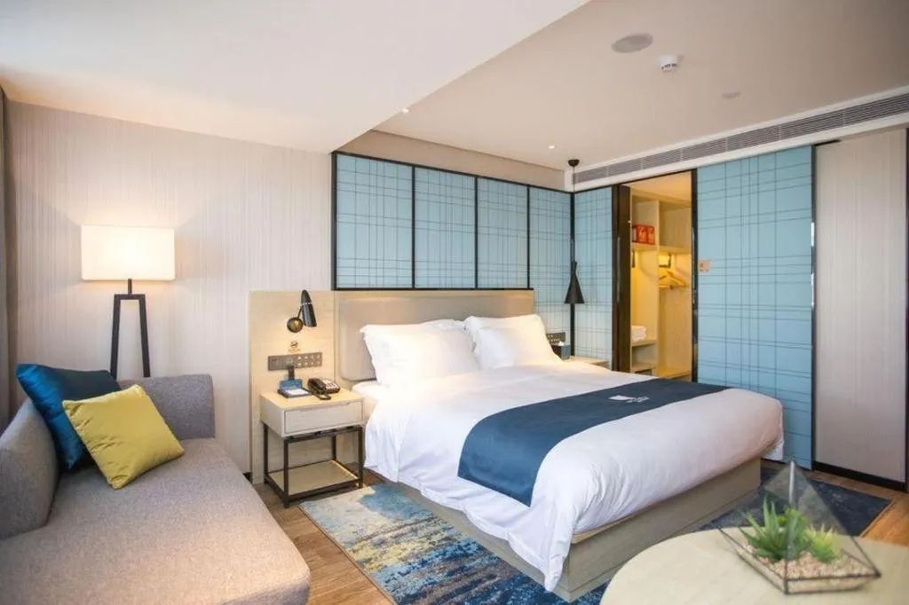 Bed in Echarm Hotel Shenzhen World Exhibition and Convention Center