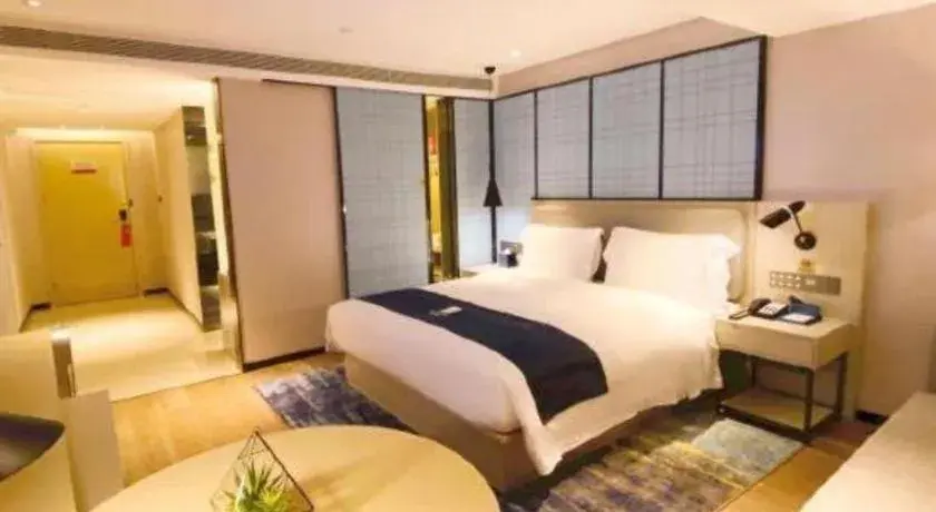 Bed in Echarm Hotel Shenzhen World Exhibition and Convention Center Bed in Echarm Hotel Shenzhen World Exhibition and Convention Center