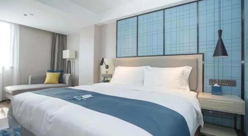 Bed in Echarm Hotel Shenzhen World Exhibition and Convention Center