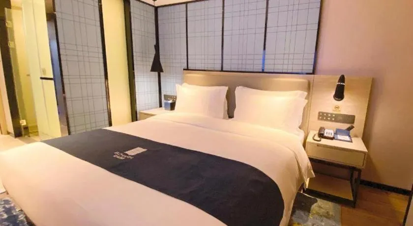 Bed in Echarm Hotel Shenzhen World Exhibition and Convention Center
